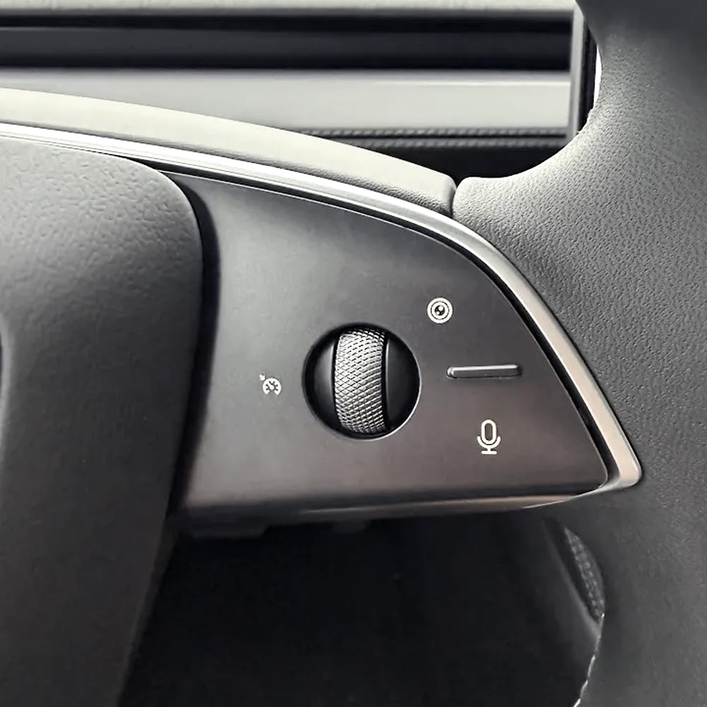 Matte clear PPF applied on the steering wheel buttons of a Tesla Model Y Juniper